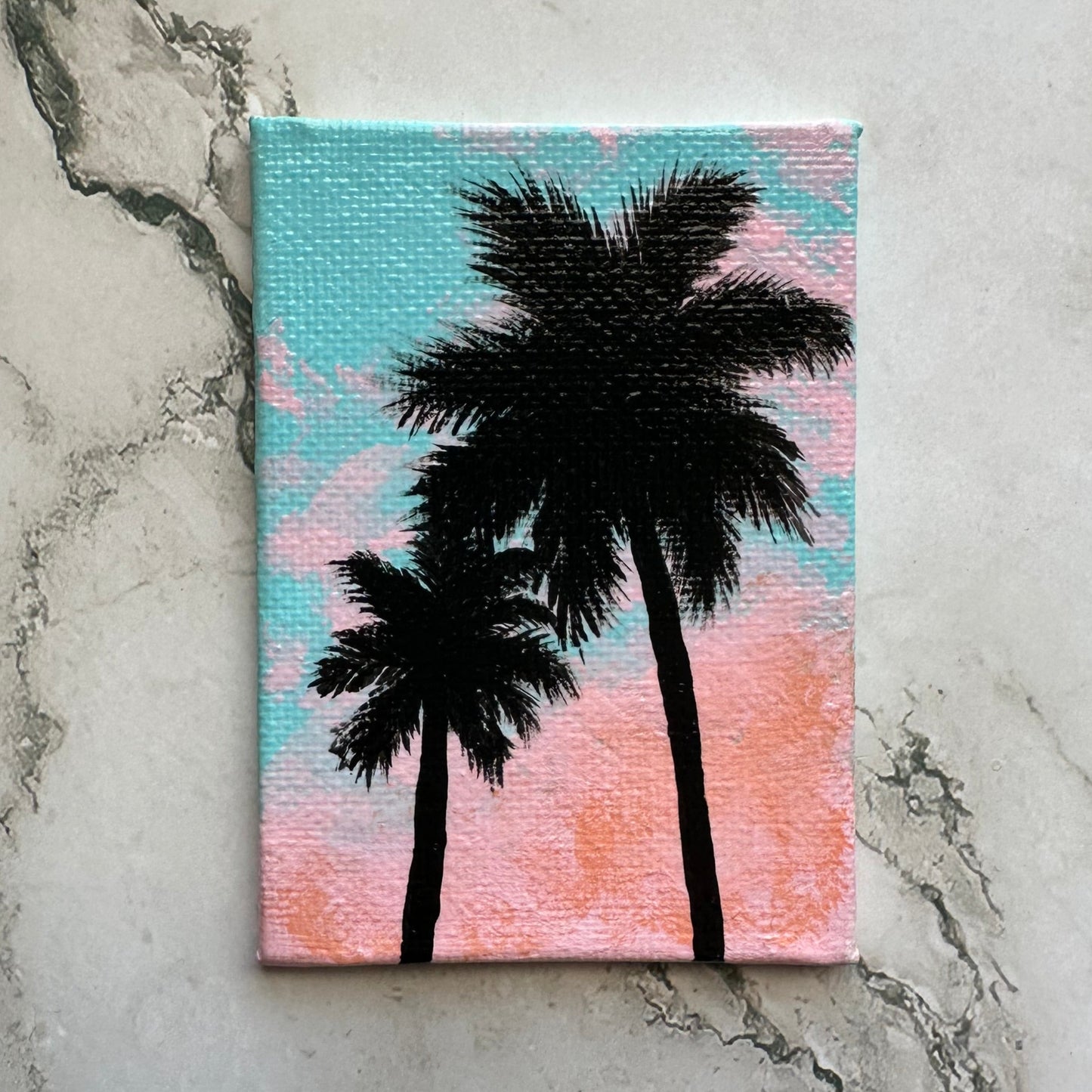 mini palm trees with easel