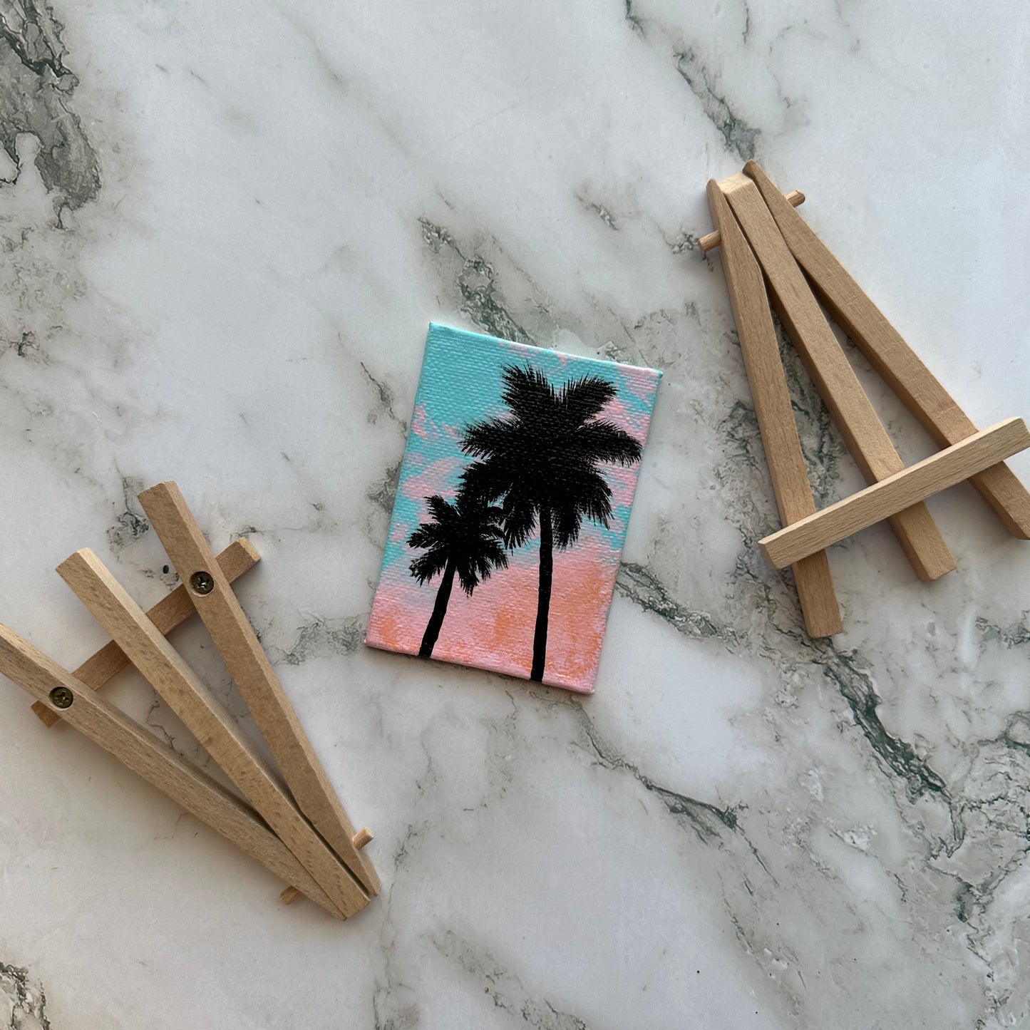 mini palm trees with easel
