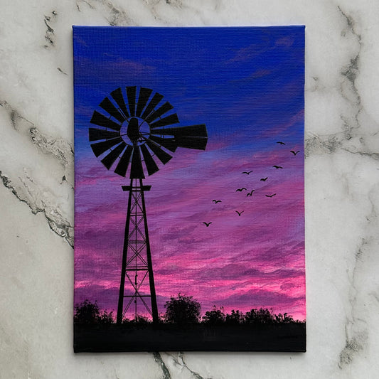windmill over sunset