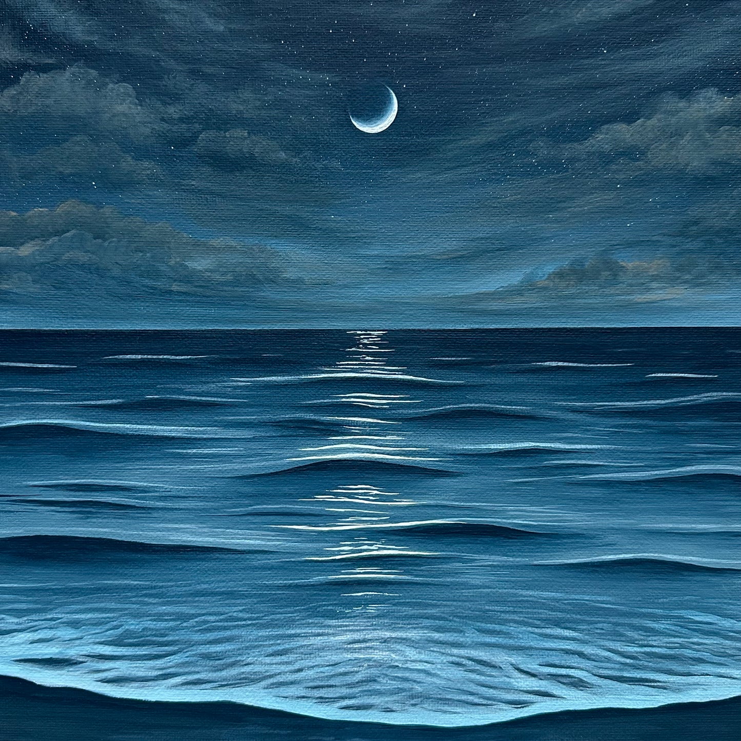 crescent moon over the sea