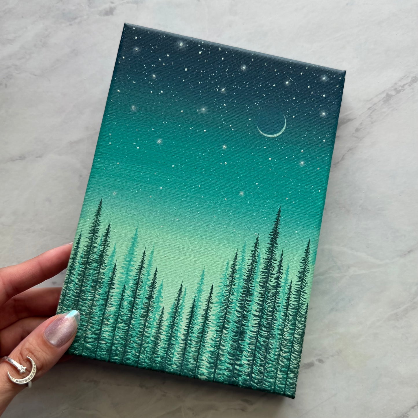 held by a mint sky