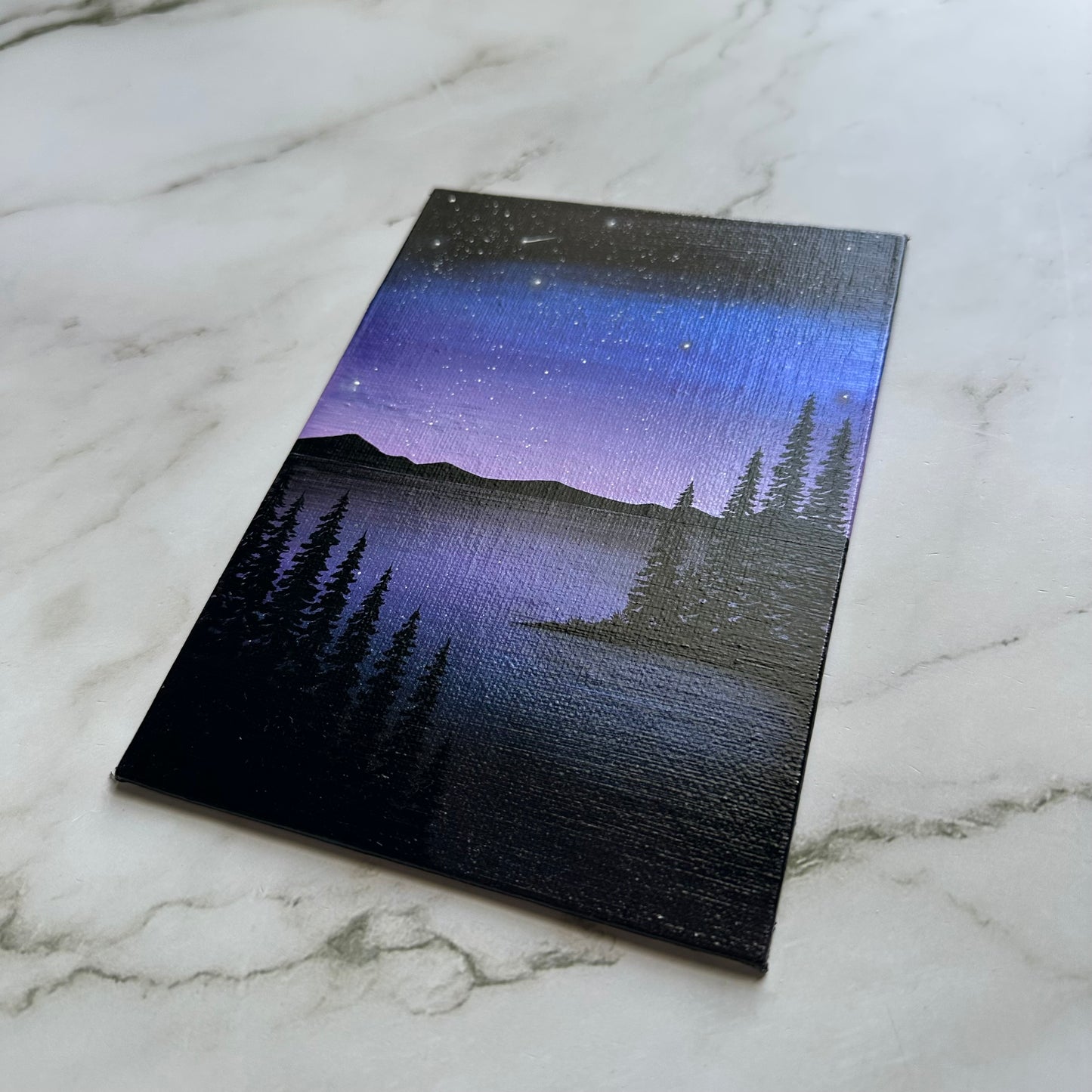beneath the violet glow
