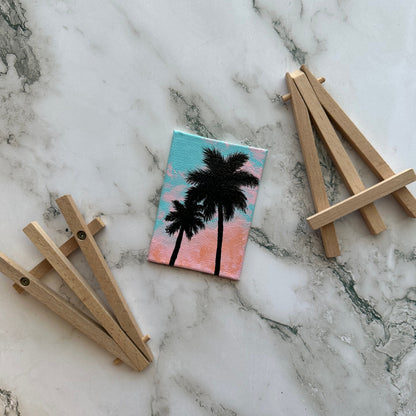 mini palm trees with easel