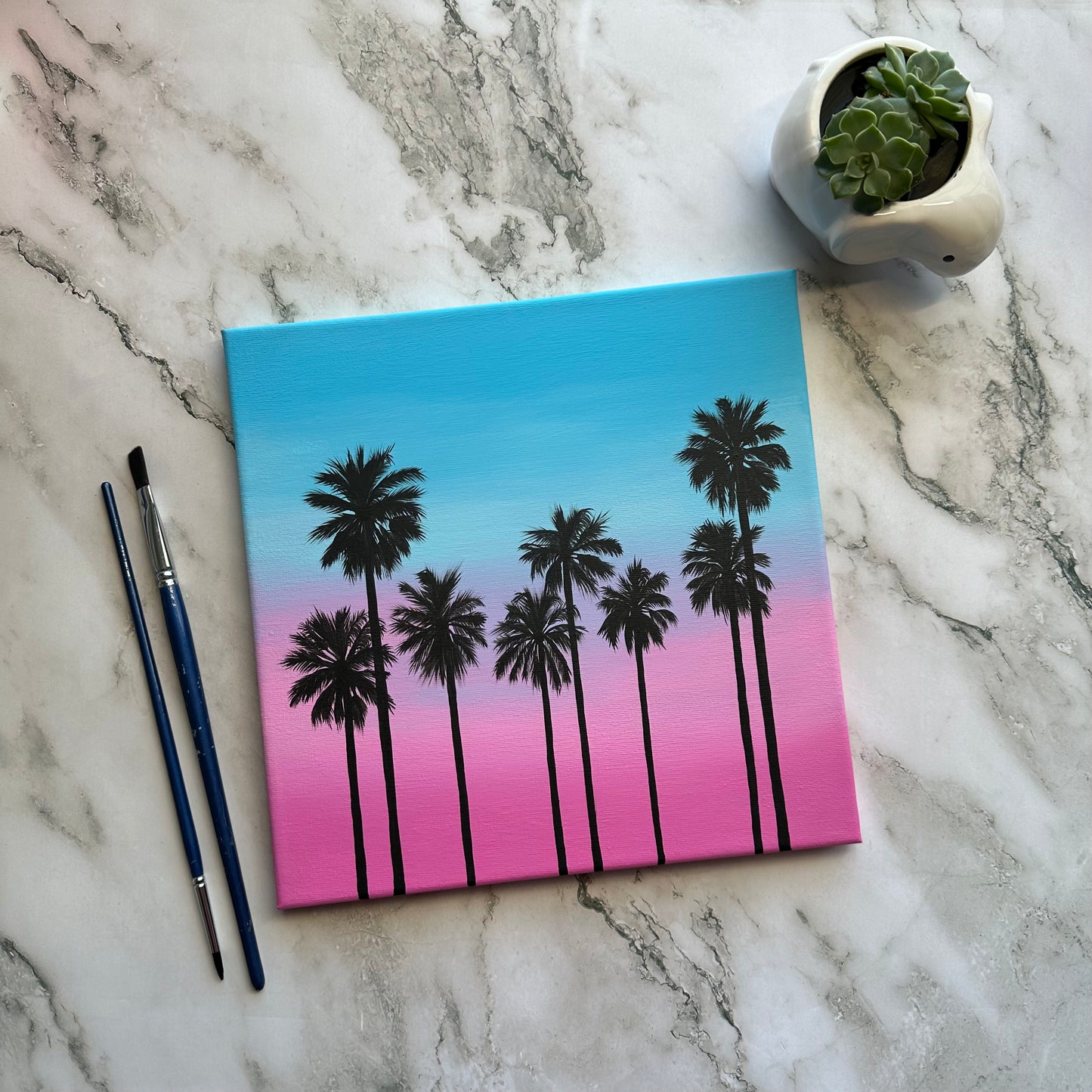 palms and a cotton candy sunset